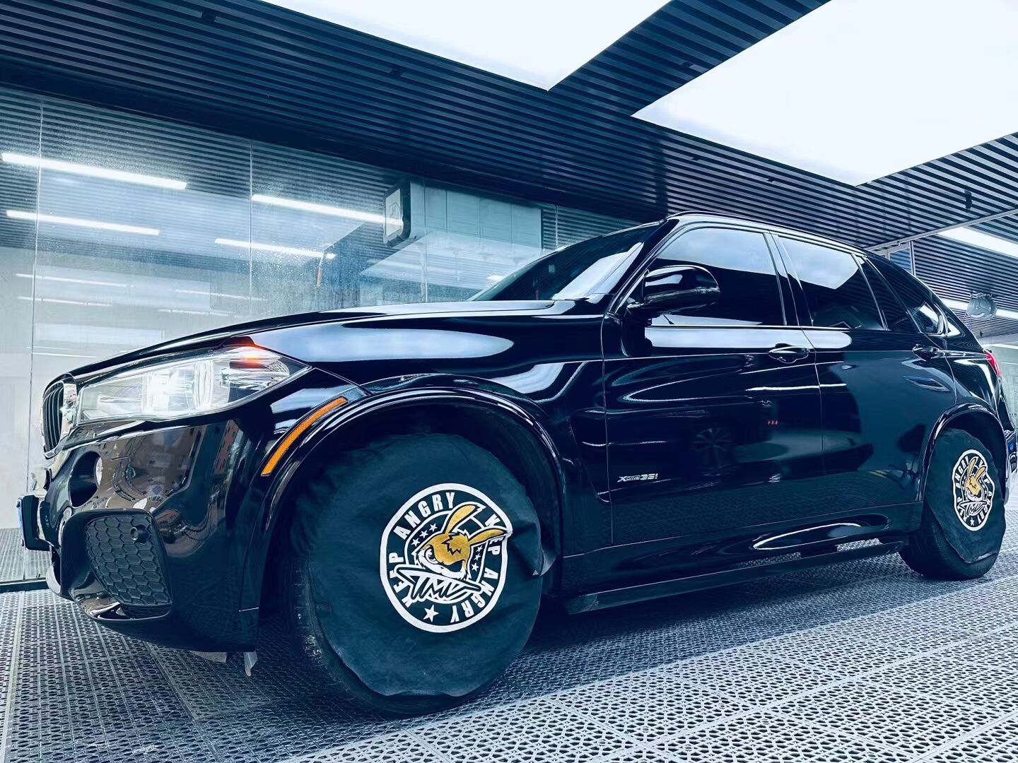 宝马X5改色钢琴黑完工……(图5)